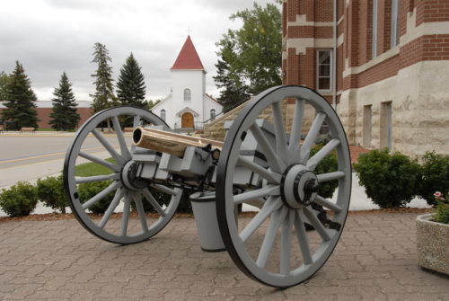  In 2002, the Friends contributed $21,200 for the restoration of the two Seven Pound Bronze Mark II Field Guns that stand guard next to the RCMP Cenotaph adjacent to Sleigh Parade Square at "Depot". Serial No. 377 stands on the left and Serial No. 397 is on the right. Photo: RCMP